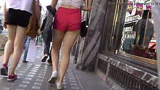 Sexy young blonde babe is naughty on the street in shorts