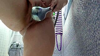 Blonde MILF gets down to some unsupervised shower time with buttplug