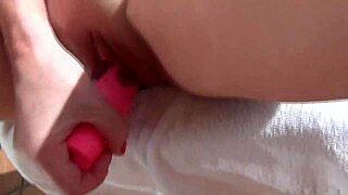 Rubbing a vibrator, Christie’s big tits shake