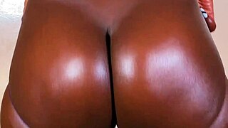 Black sexy goddess has big boobs and shows off how she strips it off