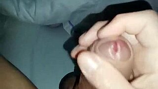 Guy masturbating in bed