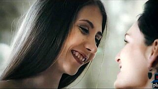 petite teen and busty milf engage in lesbian kissing and licking session