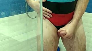 Tranny Teases in Adidas Swimsuit!