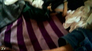 The lesbian watches porn and starts masturbating passionately