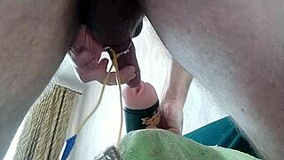 guy moaning and shaking while cumming inside a fake pussy