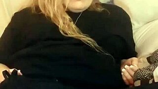 mature blonde milf fingers herself and cums during financial domination session