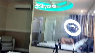 wife enjoys time with husband's friend in hotel