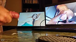 Guy masturbates intensely at desk with computer