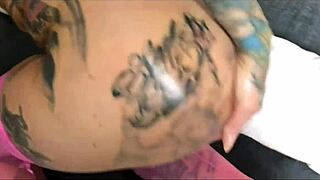 Tattooed woman in amateur college group scene