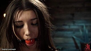 HD video of BDSM toy play with choking gagging aspect