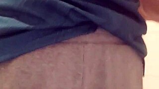 Man Pees in Bathroom Stall