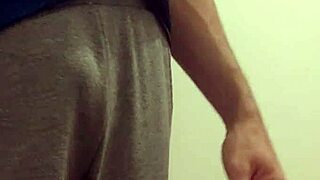 Man Pees in Bathroom Stall