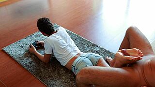 Gamer girl plays NFS while giving footjob 😏