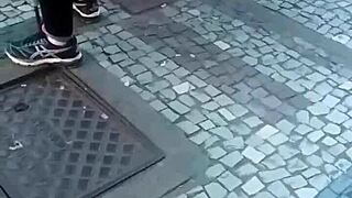 Hot brunette flaunts legs at bus stop