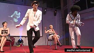 Male strippers flaunt huge cocks to eager ladies on stage