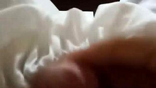 Two gay men engage in a full fuck session, exploring each other's cocks passionately.