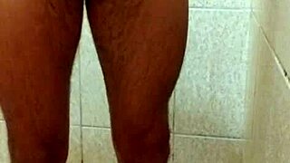 Young Stud Showers And Displays His Impressive Cock