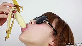 asian women lick bananas