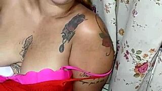 African Beauty with Big Tits and Tattooed Ass Teases Cock