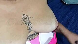 African Beauty with Big Tits and Tattooed Ass Teases Cock