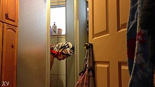 Amateur video shows mature woman taking a shower