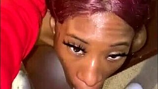 ebony teen deepthroats monster cock on sofa