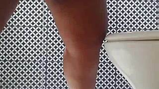 I watch ebony milf housewife with big tits and ass washing bathroom naked