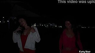 Two teenage girls take a leak on a public beach