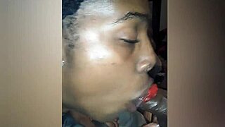 Slim girl enjoys eating candy in a fun way