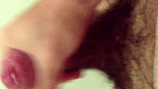 Friendly gay handjob session with a greasy cock