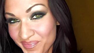 Kendall performs a sexy tease with fetish elements