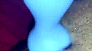 Ebony MILF rubs her clit hard in homemade video. She squirts intensely while masturbating for the camera.