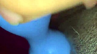 Ebony MILF rubs her clit hard in homemade video. She squirts intensely while masturbating for the camera.