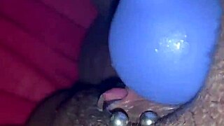 Ebony MILF rubs her clit hard in homemade video. She squirts intensely while masturbating for the camera.