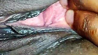 Horny babe fingering her wet pussy with intensity