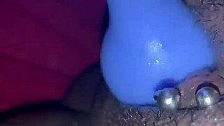 Ebony MILF rubs her clit hard in homemade video. She squirts intensely while masturbating for the camera.