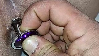 curvy woman enjoys self-pleasure with a toy