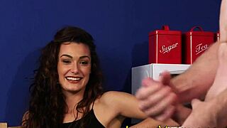 Clothed brunette observes the humiliation scene with femdom elements