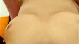 The wife feels intense pleasure as her fuck buddy fucks her arse in the kitchen, leading to a powerful orgasm