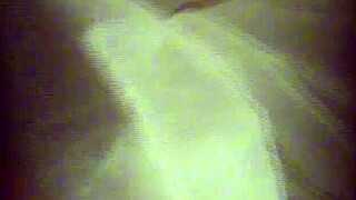 hidden cam catches cute blonde masturbating behind curtain