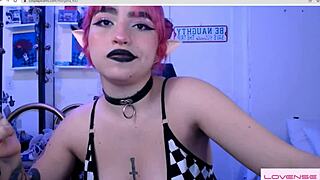 Bored Elf in Cosplay Costume Plays with Toys on Webcam
