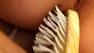 i'm fucking my hairbrush in the ass