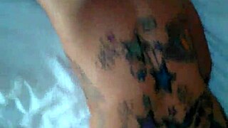 Detailed view of nasty heels shoes and tattoos