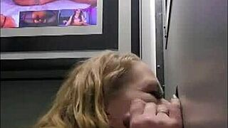 blonde woman cheats with big black cock at gloryhole