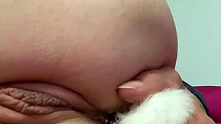 Sexy woman engages in anal play