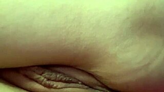 Sexy woman engages in anal play