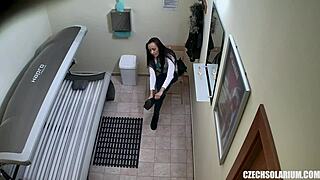 Private cam records a sexy verbose naked lady in a public solarium