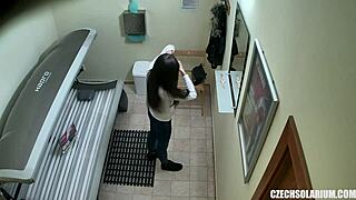 Private cam records a sexy verbose naked lady in a public solarium