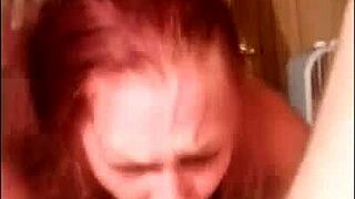 Redhead milf amateur enjoys double penetration in homemade threesome