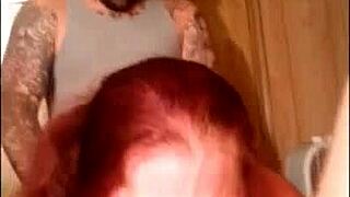 Redhead milf amateur enjoys double penetration in homemade threesome